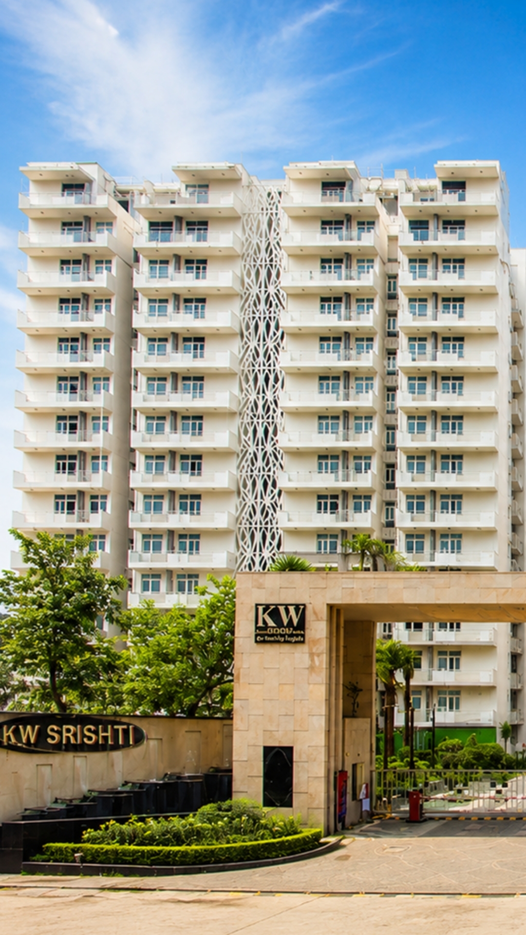 KW Srishti — twin-tower gateway facade at the 10-acre Raj Nagar Extension township