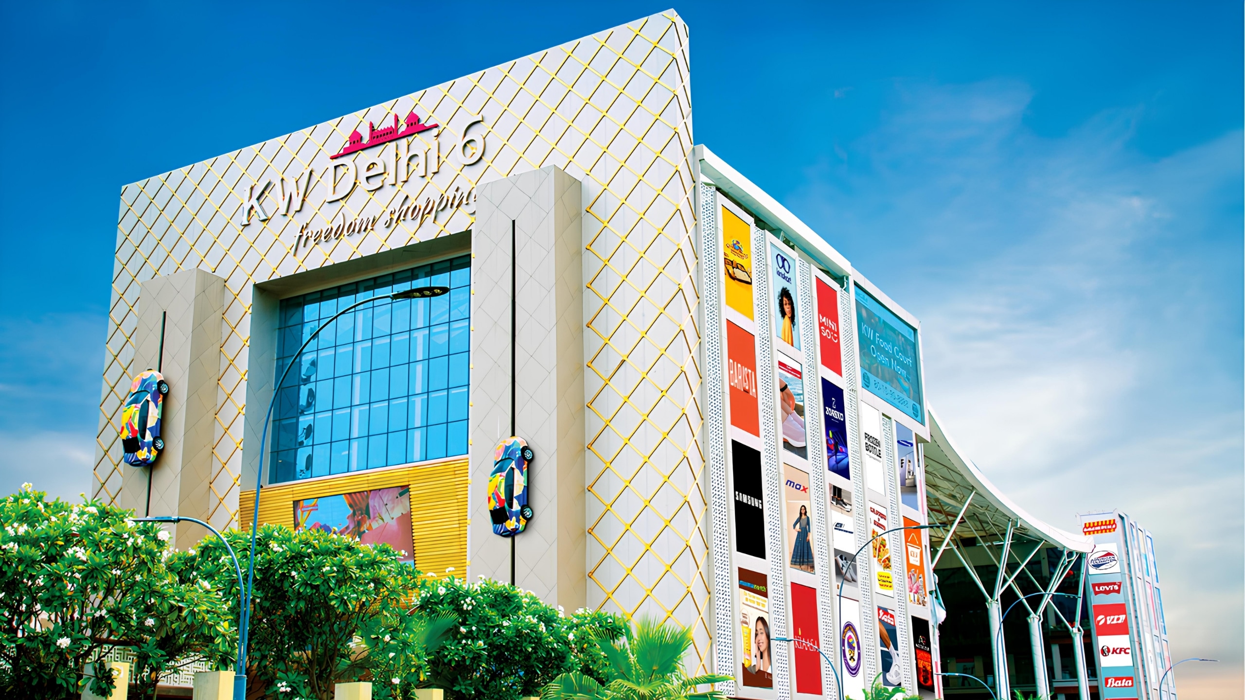 KW Delhi 6 funnel-shaped commercial complex with illuminated facade in Raj Nagar Extension