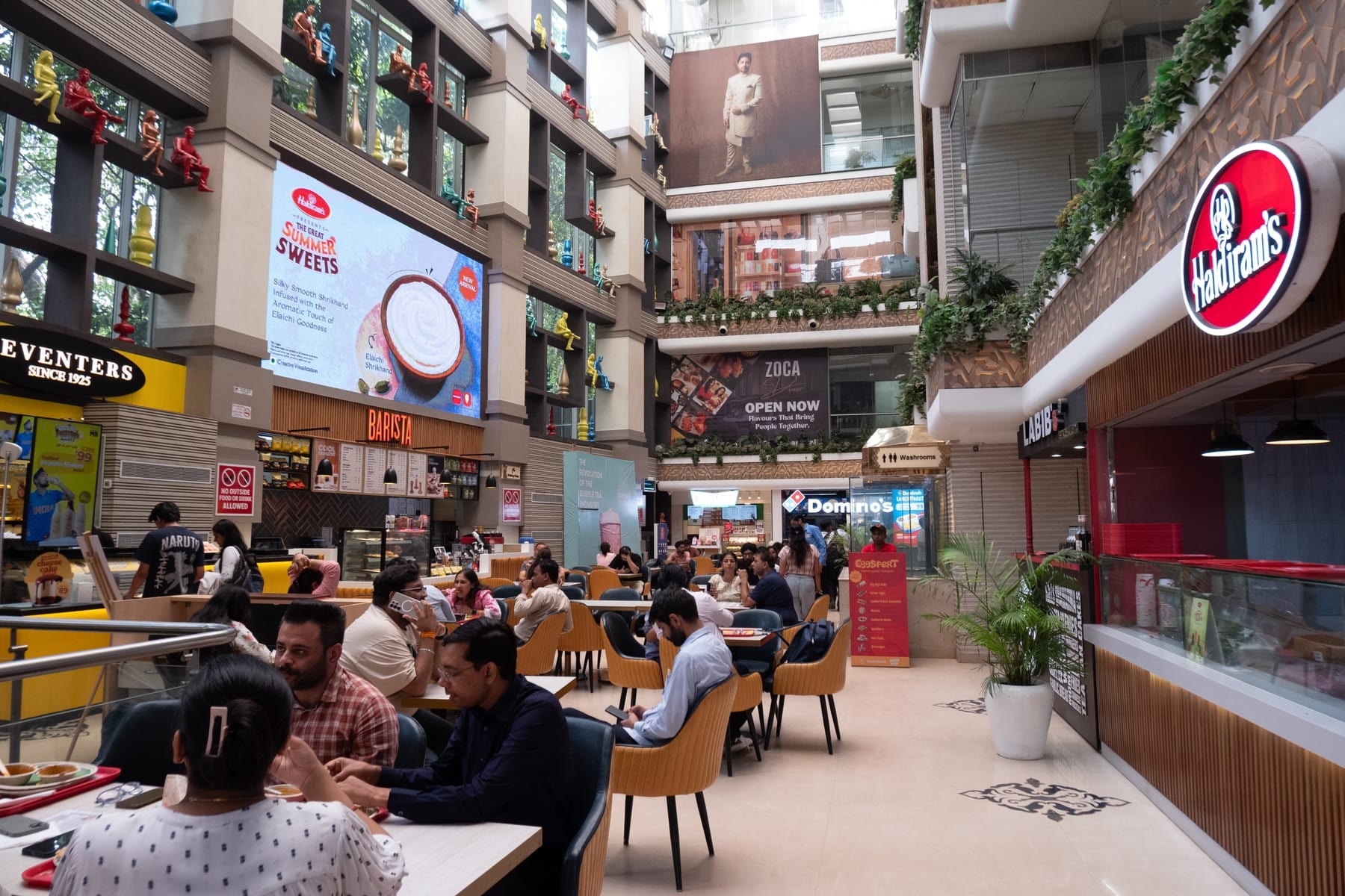 KW Blue Pearl multi-level food-court atrium with anchor brands