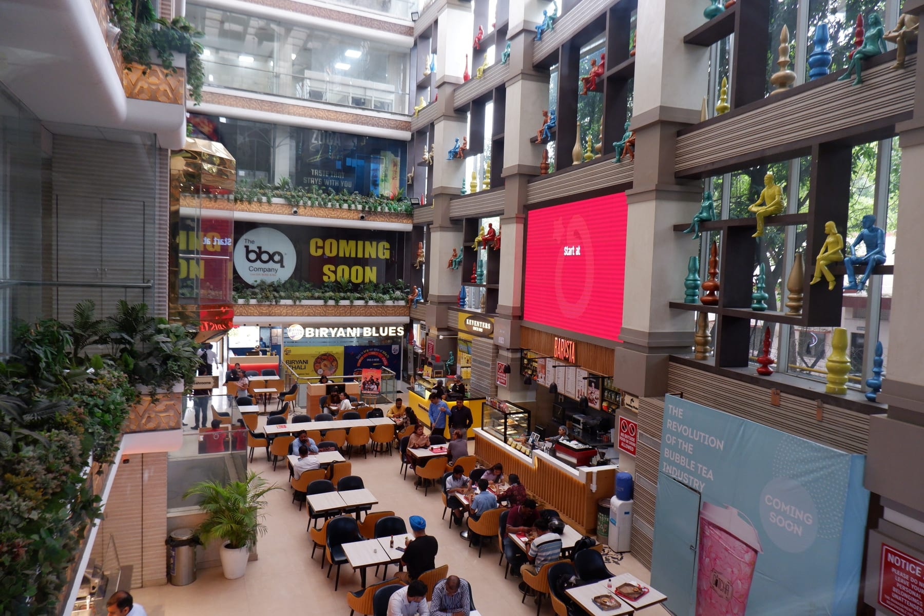 KW Blue Pearl atrium and tiered dining seen from an upper level
