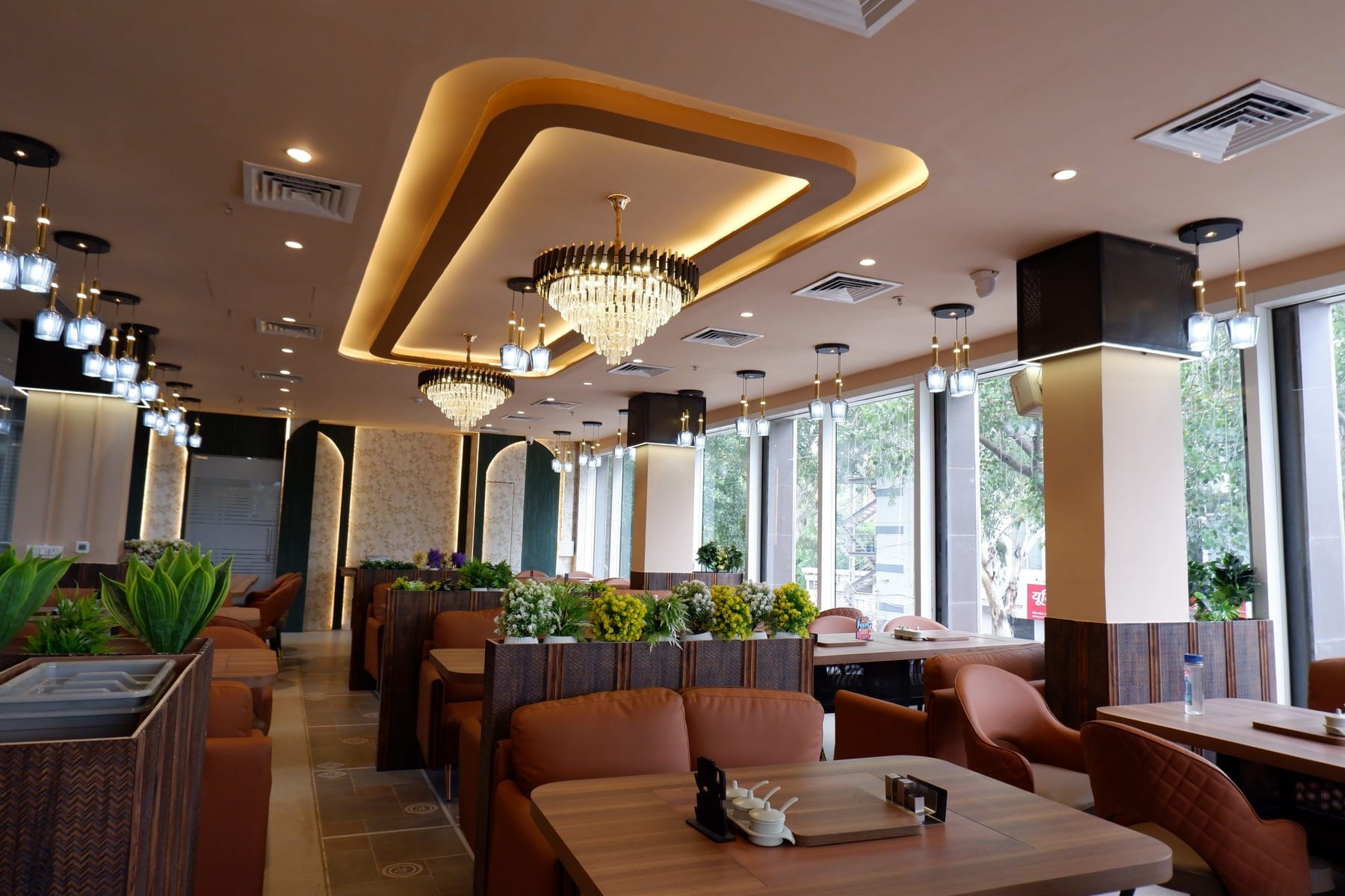 KW Blue Pearl restaurant lounge under a feature chandelier