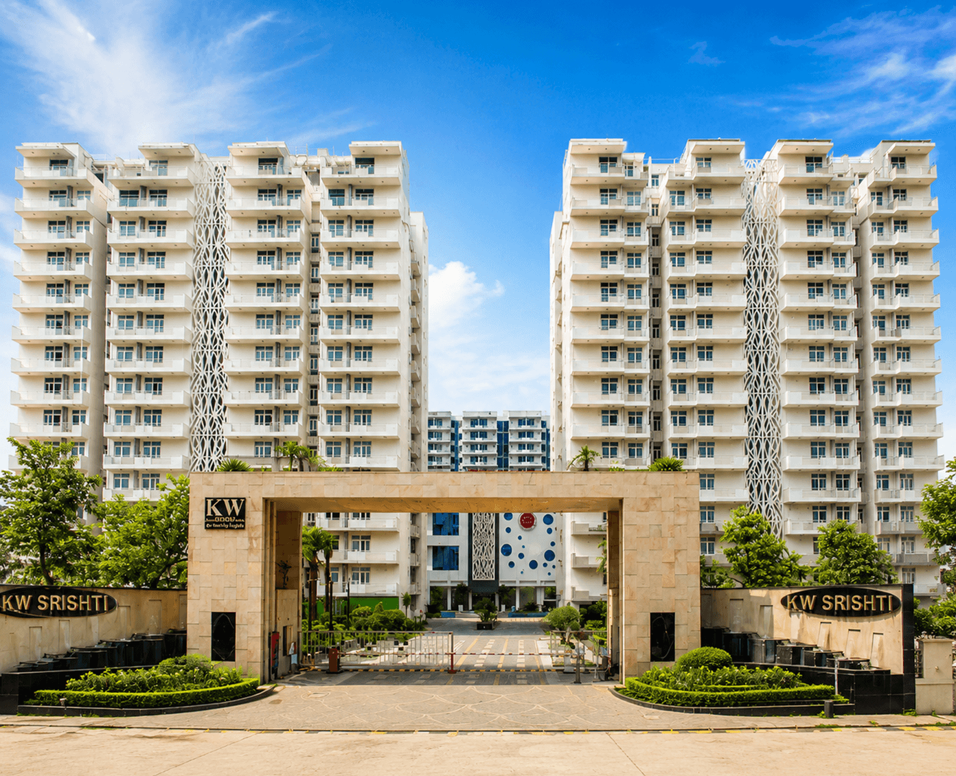 KW Srishti township during the day with central greens